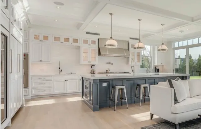 Kitchen island painted in a dark slate blue