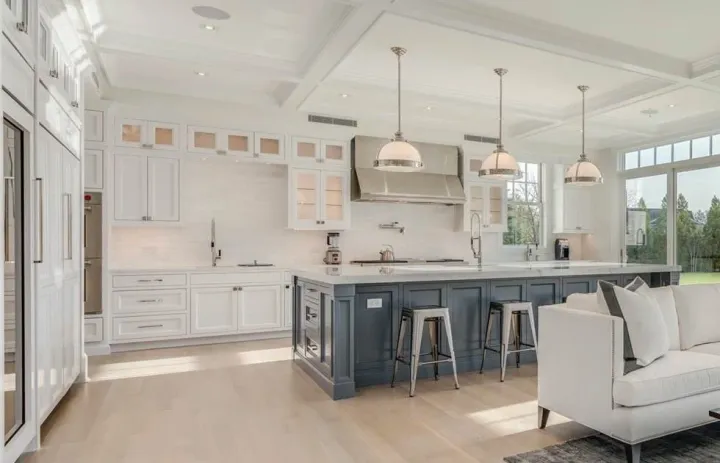 Kitchen island painted in a dark slate blue