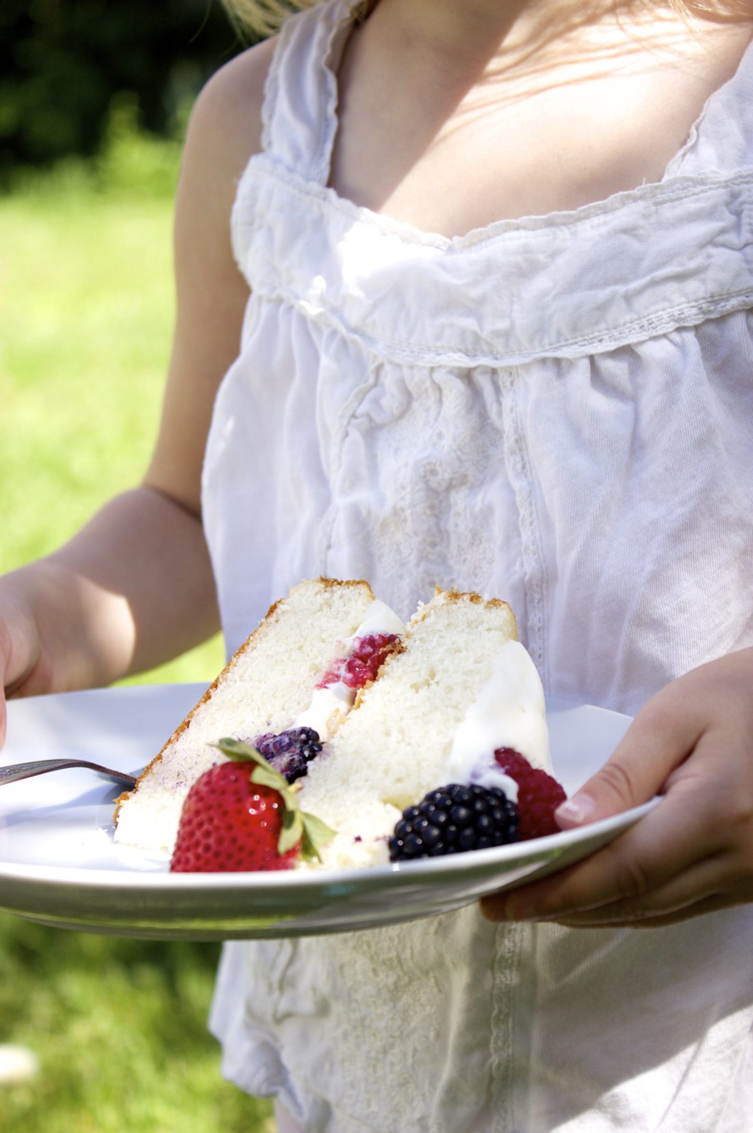 The Perfect Tender White Cake (with whipped cream cheese cloud frosting & berries)